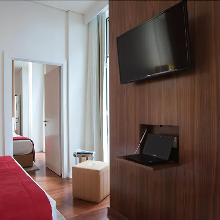 The 7 Hotel, Suites, & Отель Лиссабон